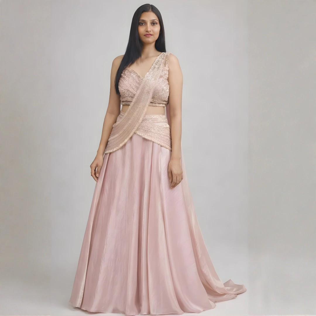 Blush pink lehenga saree with flowing skirt and modern saree drape design