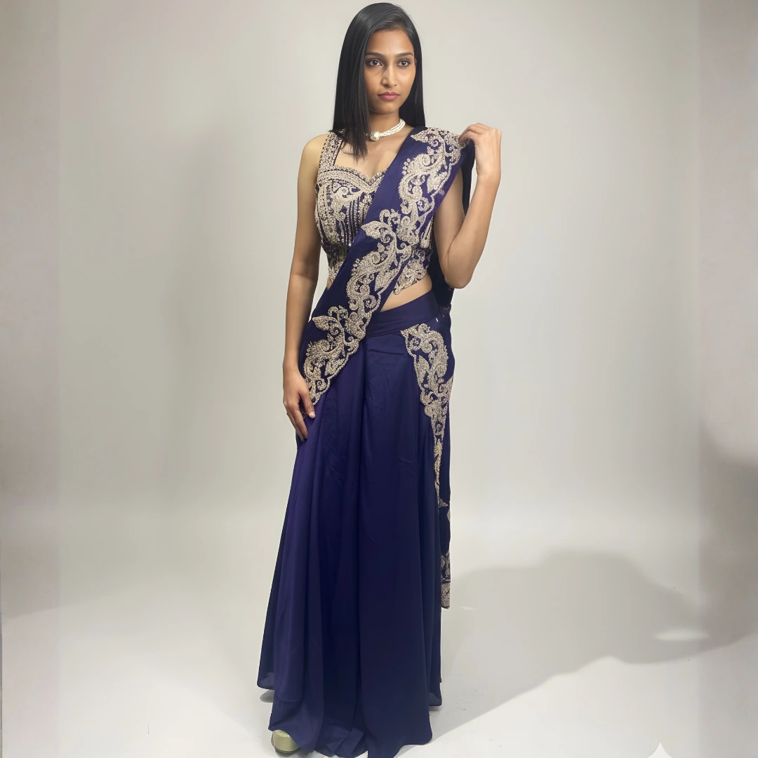Full length navy blue lehenga saree with gold embroidered blouse and draped saree look