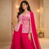 Hot pink party wear Sharara with heavy golden zari and cut dana hand embroidery for wedding reception and sangeet