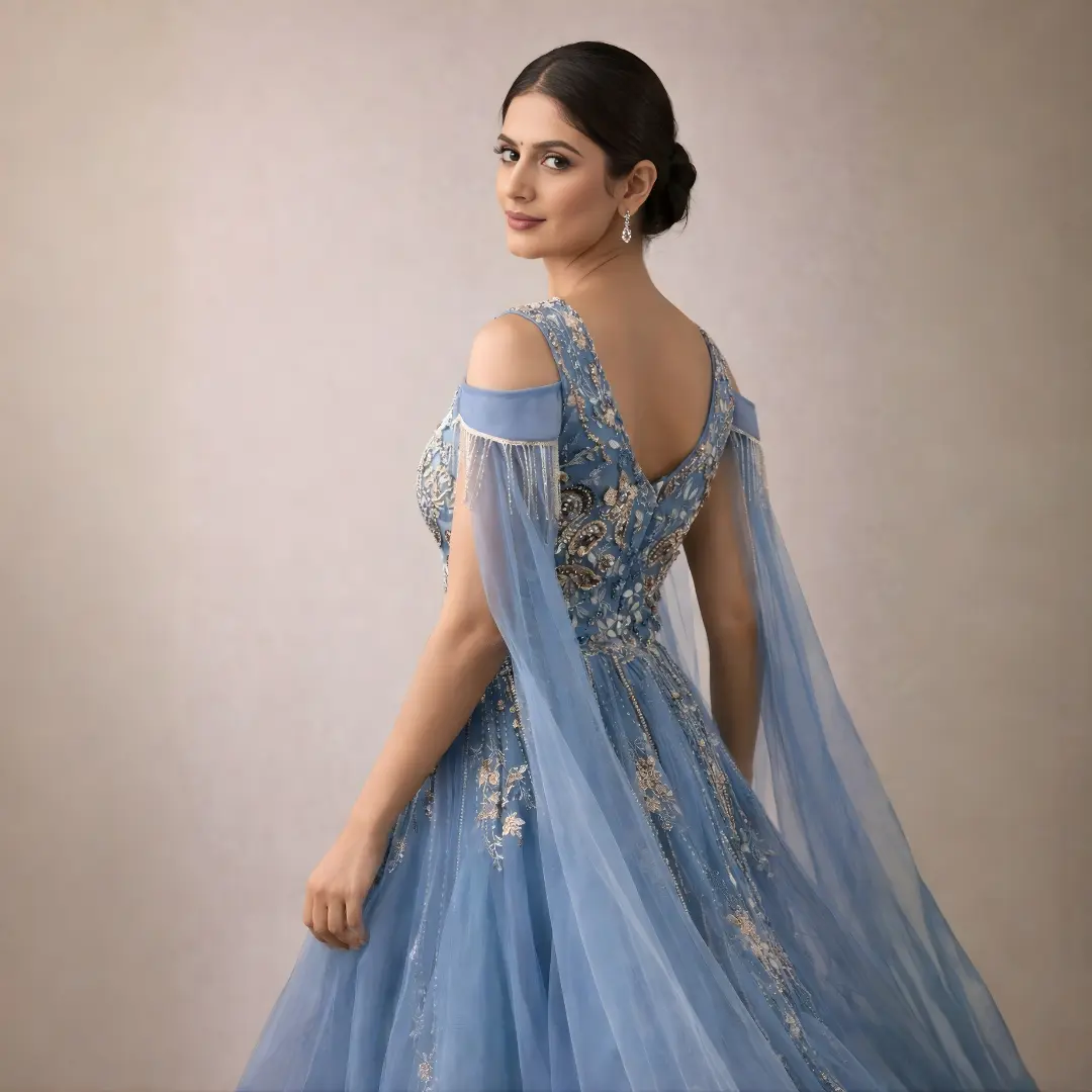 Side view of light sky blue embroidered party wear gown showing flattering fit and flowy net flare