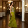 Side profile of olive green indo western ready saree showing pre stitched drape and waist fit