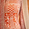 Close-up of zardosi and cut dana hand embroidery on rust sharara jacket