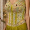 Close up of zardosi and cut dana hand embroidery on olive green saree blouse