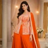 Flowy rust sharara set with zardosi work shown in movement for festive wear